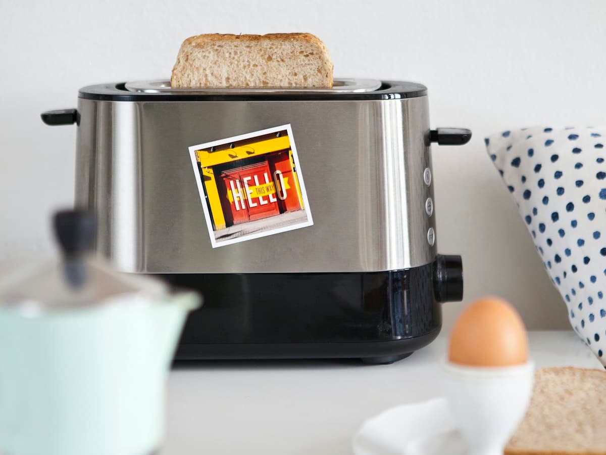 A pop-up toaster with two slices of bread